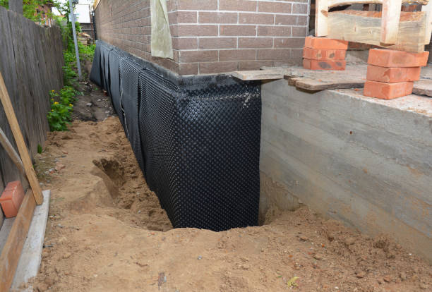 SJ Waterproofing Pros technician performing targeted Foundation Crack Repair assessment in Readyville, TN